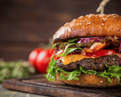 Toasted grilled burger on a chopping board